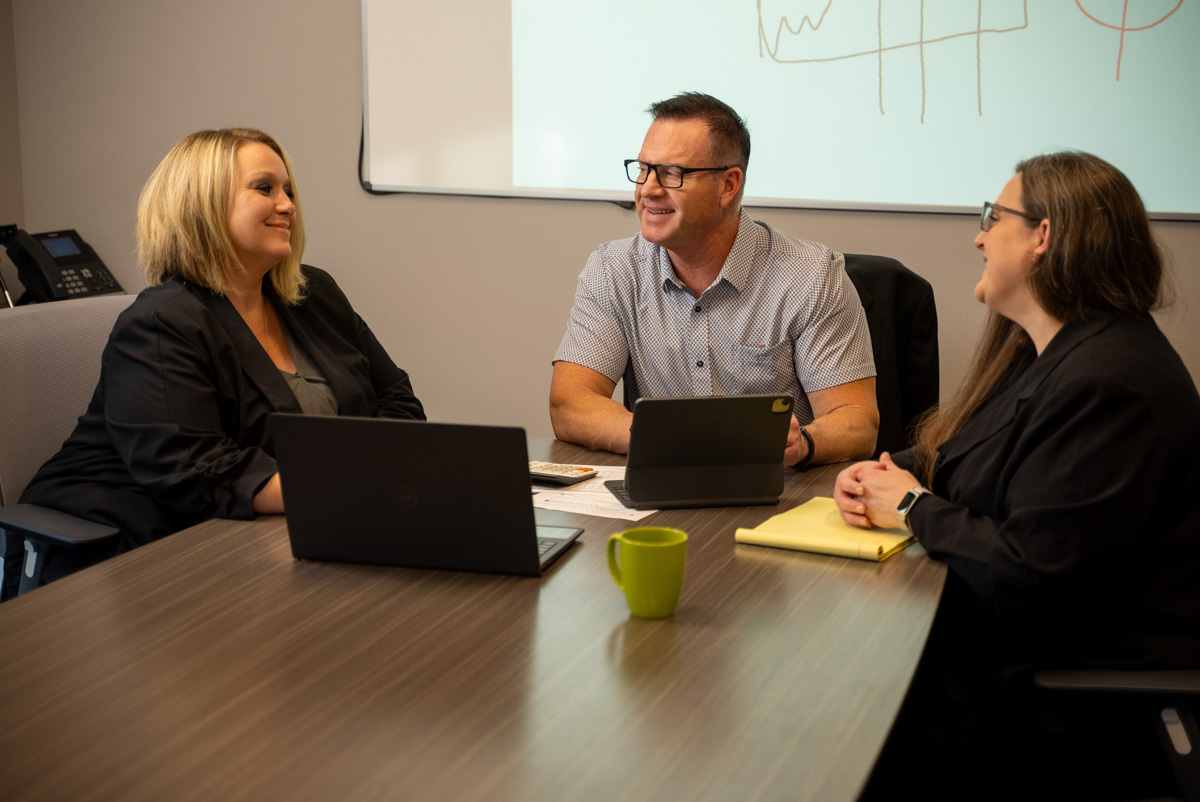 3 Rivers Financial Group team members working together